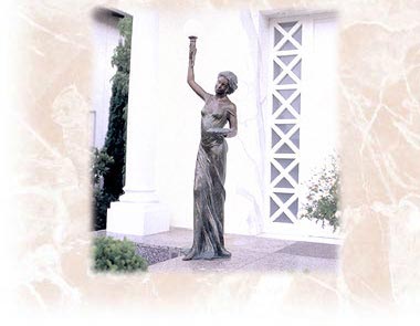 Mod. Bronzefigur mit Leuchte